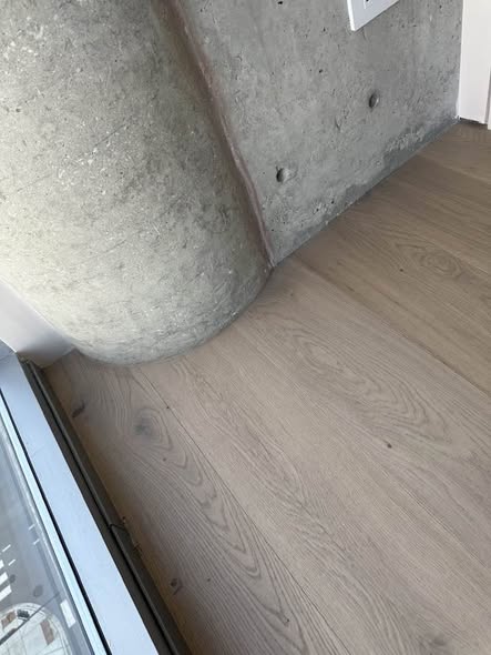 Light grey hardwood in high-rise luxury condo