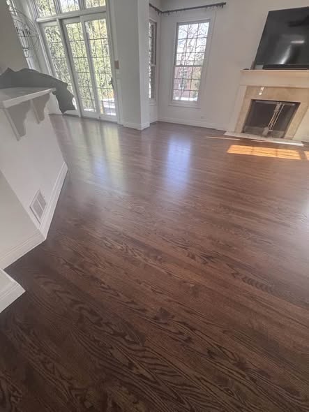 Finished hardwood flooring in a light-filled Chicagoland home