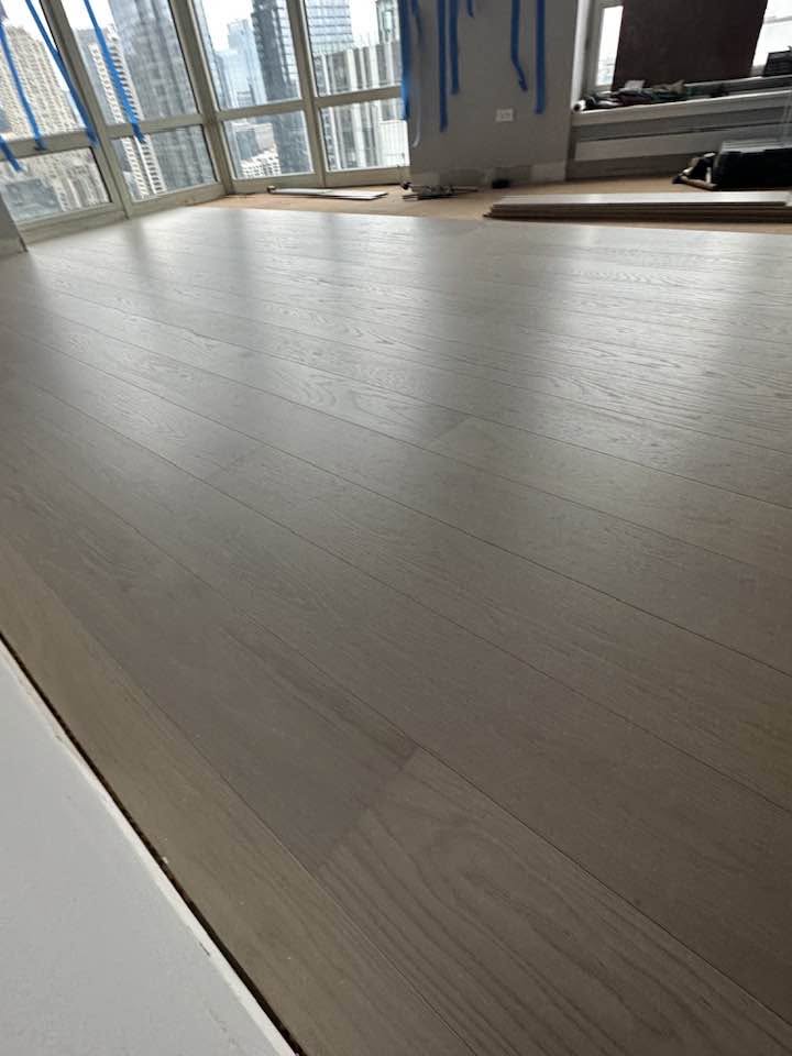 Wood flooring with long board lines in an MGM interior project