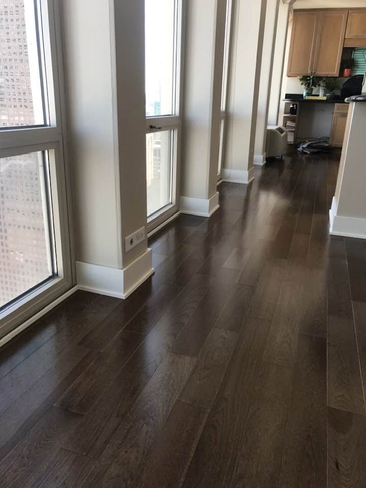 Light hardwood fitted around posts and perimeter details