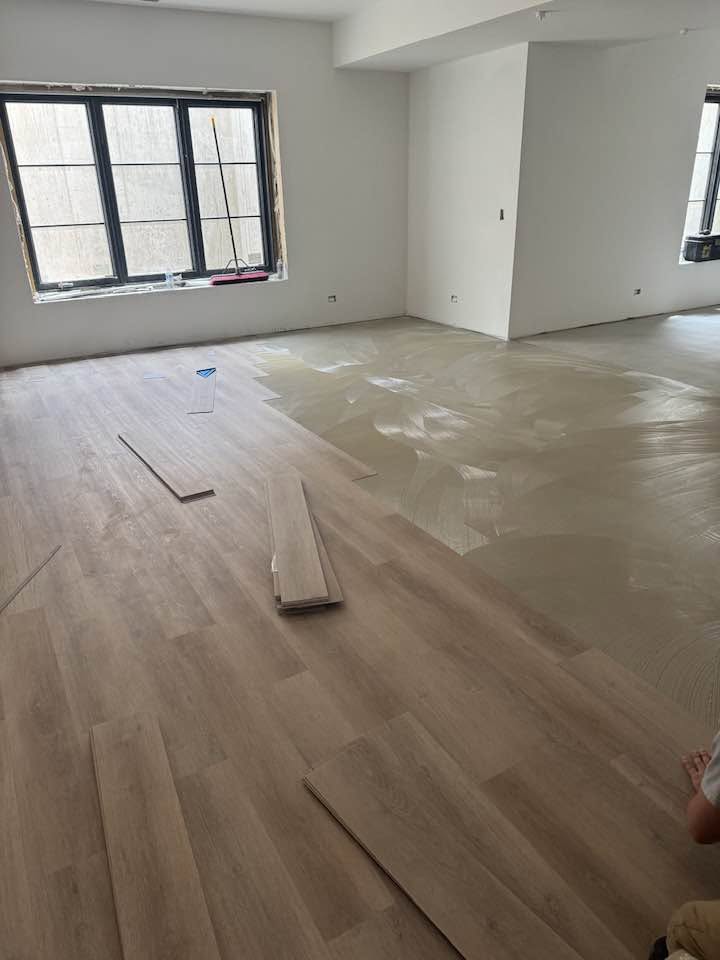 Hardwood boards meeting walls and architectural openings